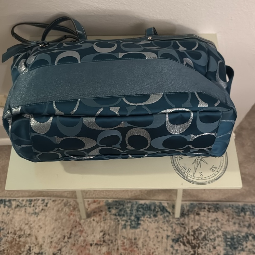 Coach diaper bag! Rich turquoise color. Several compartments  w/ strap